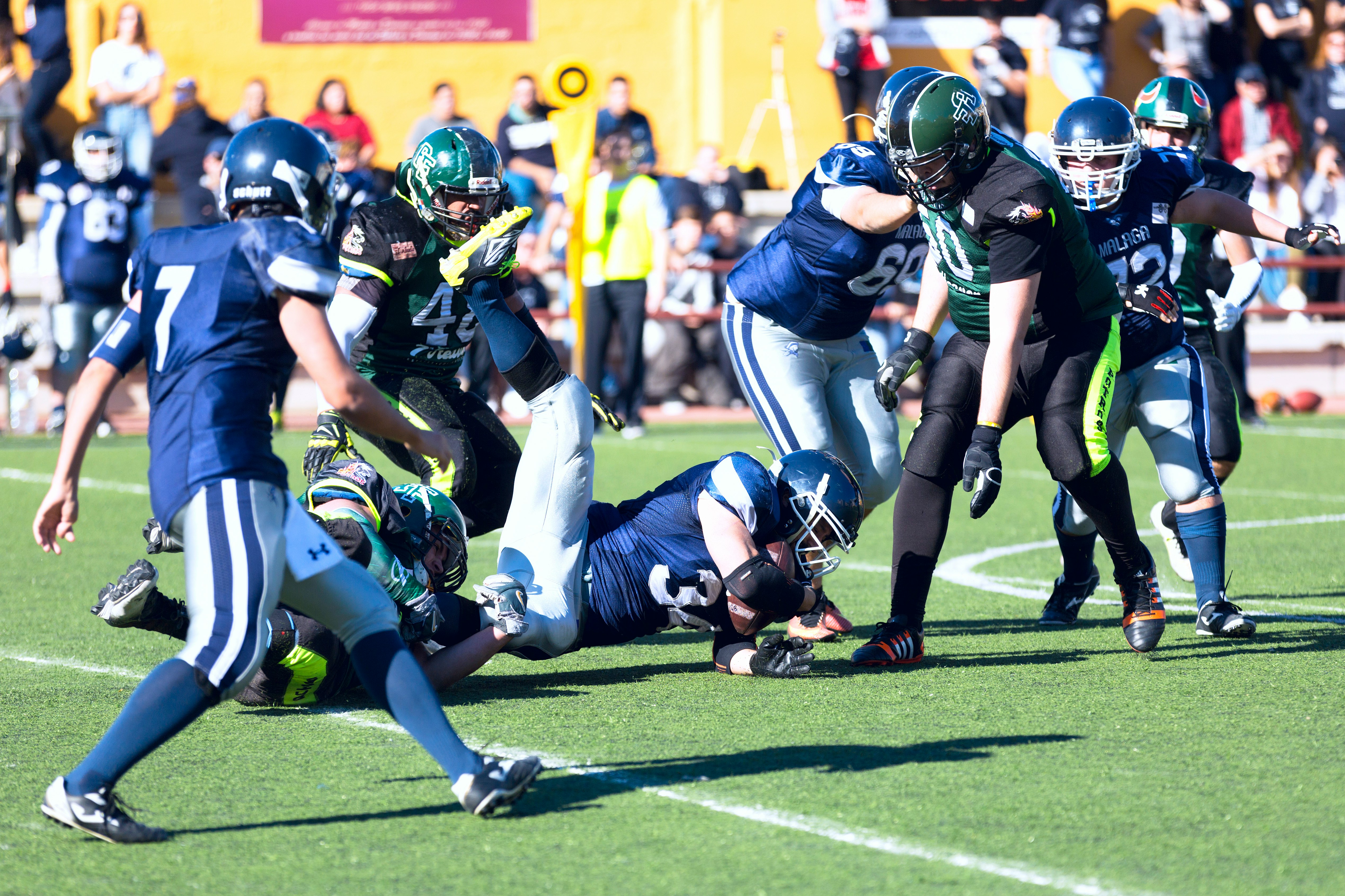 group of people playing football